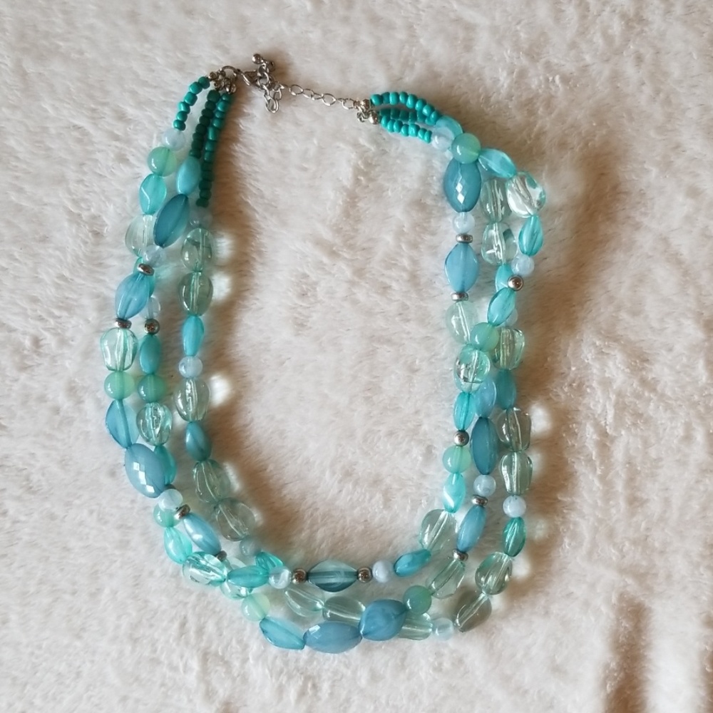 Light blue necklace (free with a $12+ purchase)